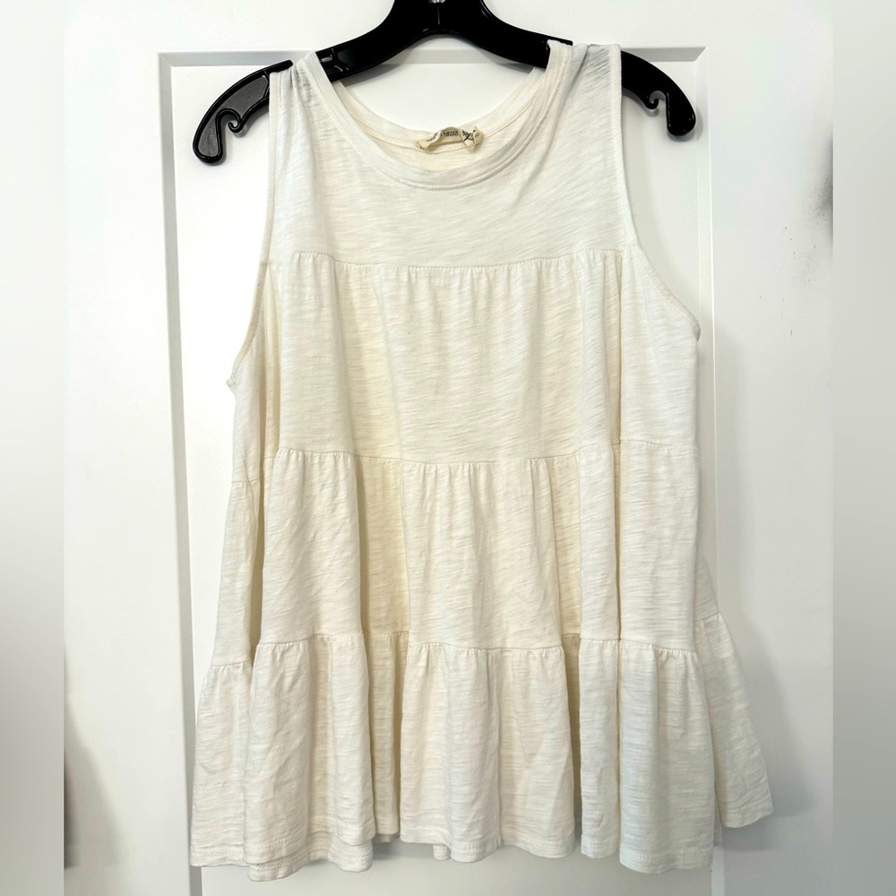 White babydoll shirt from Anthropologie